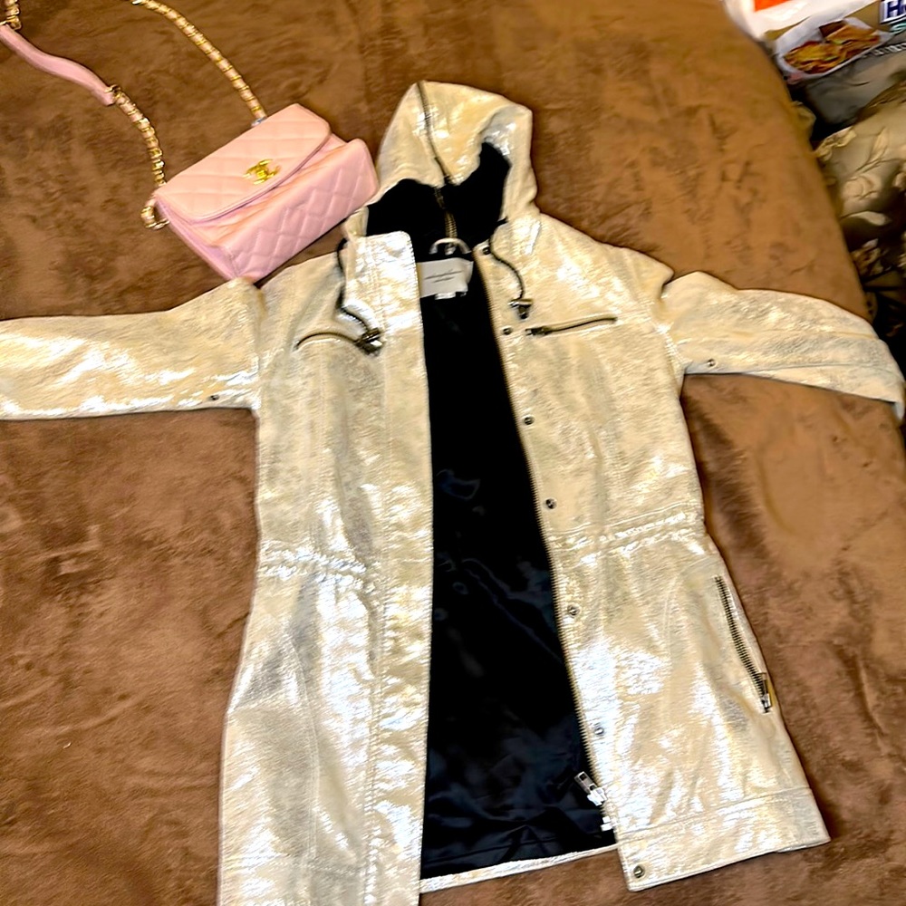 Tan leather jacket. By Adam Lippes